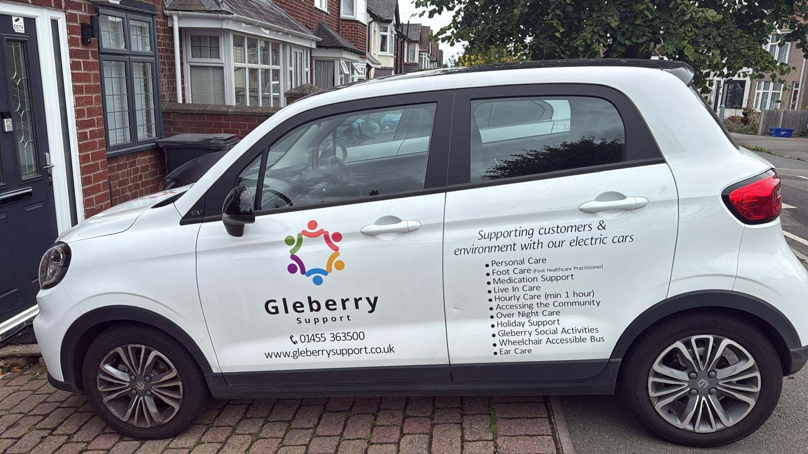 Gleberry Support white electric car — eco-friendly transport